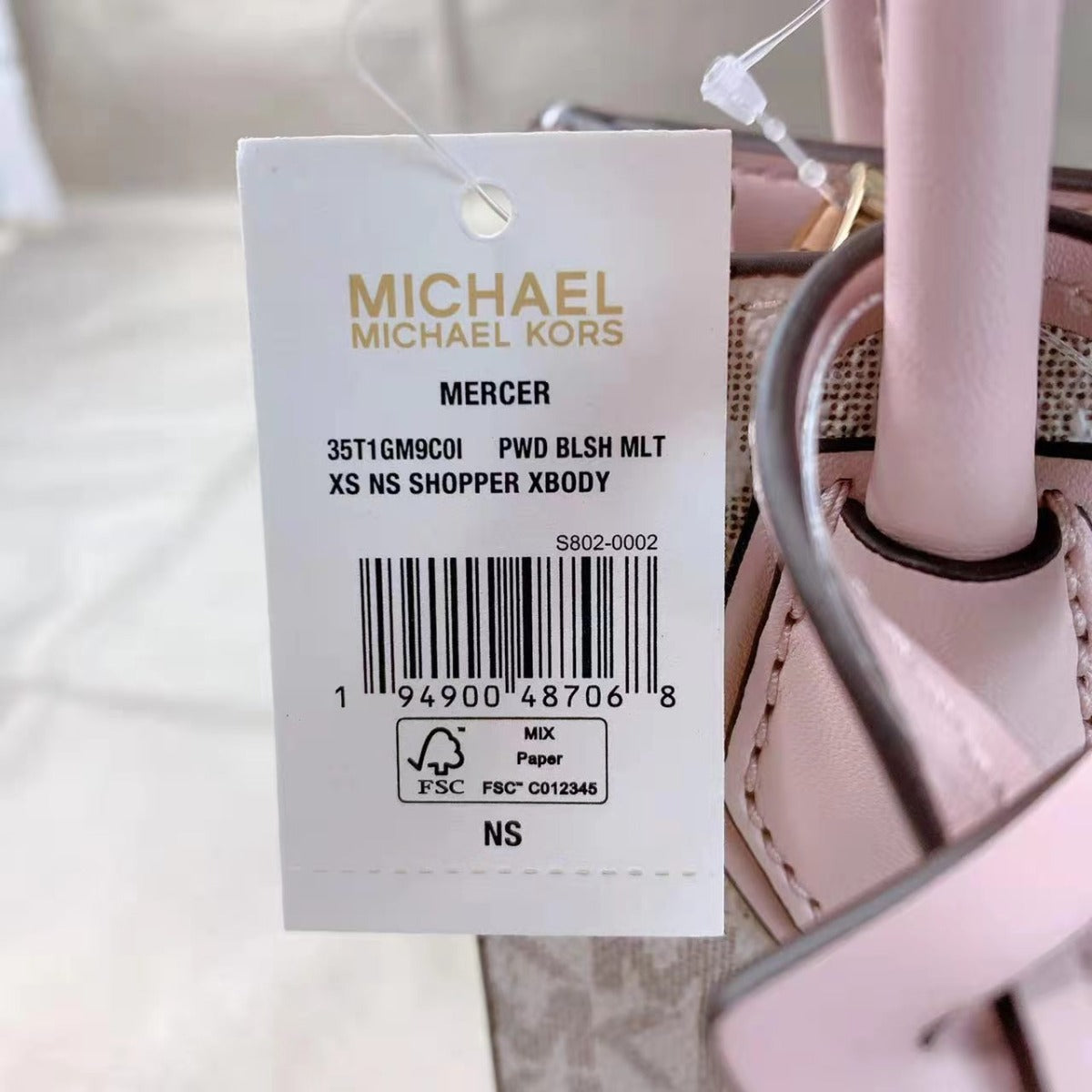 Michael Kors Mercer Extra-Small Logo and Leather Crossbody Bag In Powder Blush Multi Michael Kors Mercer Extra-Small Logo and Leather Crossbody Bag In Powder Blush Multi